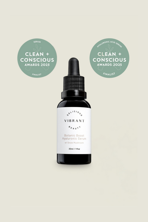 Delicious Vibrant Beauty Bontic Boost serum bottle with 'Clean + Conscious' awards on a light beige background