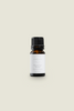 A small dark glass bottle with a black cap, labeled with 'Relaxation - Citrus, Lavender and Sandalwood Essential Oil'.